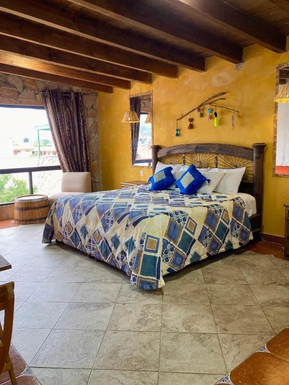 Rustic guest room at Hotel & Cava La Parroquia